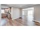 Spacious living room with hardwood floors, connecting seamlessly to the modern kitchen at 4014 N Capitol Ave, Indianapolis, IN 46208