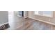 Spacious living room with hardwood floors featuring fireplace and lots of natural light at 4014 N Capitol Ave, Indianapolis, IN 46208