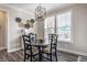 Charming dining area with round table and chairs, and decorative wall accents at 4049 Forbes Rd, Bargersville, IN 46106