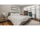 Spacious bedroom with a cozy bed and built-in workspace at 502 Lockerbie S Cir, Indianapolis, IN 46202