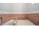 Finished attic space with exposed brick walls and skylight at 503 S Harrison St, Alexandria, IN 46001