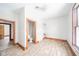 Bedroom with hardwood floors, an ensuite bathroom, and access to other rooms at 503 S Harrison St, Alexandria, IN 46001