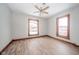 Spacious bedroom with hardwood floors and large windows at 503 S Harrison St, Alexandria, IN 46001