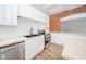 Updated kitchen with white cabinets, stainless steel appliances, and subway tile backsplash at 503 S Harrison St, Alexandria, IN 46001