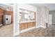 Modern kitchen with white cabinets and a breakfast bar at 503 S Harrison St, Alexandria, IN 46001