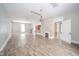 Open concept living area with a fireplace and kitchen bar at 503 S Harrison St, Alexandria, IN 46001