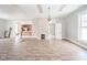 Open concept living area with a fireplace and kitchen bar at 503 S Harrison St, Alexandria, IN 46001