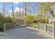 Spacious deck with built-in seating area and wooden railings at 505 Woodmere Dr, Indianapolis, IN 46260