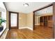 Hardwood floors and built in shelves in this living room at 5233 Chelsea Rd, Indianapolis, IN 46241