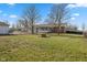 Large backyard with a patio and fire pit area at 5249 Hickory Rd, Indianapolis, IN 46239