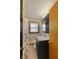 Updated bathroom with dark vanity and a shower/tub combo at 5249 Hickory Rd, Indianapolis, IN 46239