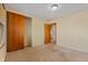 Bedroom with neutral walls and carpet flooring, and a large closet at 5249 Hickory Rd, Indianapolis, IN 46239