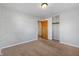 Bedroom with neutral walls, carpet flooring, and a large closet at 5249 Hickory Rd, Indianapolis, IN 46239