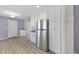 Modern kitchen with stainless steel appliances and white cabinets at 5249 Hickory Rd, Indianapolis, IN 46239