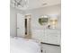 Serene bedroom with a white dresser, and a view of a bathroom at 5375 Montview Way, Noblesville, IN 46062