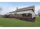 House with a spacious deck overlooking the backyard at 6023 Twyckenham Dr, Indianapolis, IN 46236
