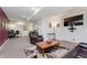 Spacious basement with a sitting area, home office space, and media area at 6023 Twyckenham Dr, Indianapolis, IN 46236