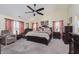 Spacious bedroom with a large bed and sitting area at 6023 Twyckenham Dr, Indianapolis, IN 46236
