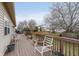 Relaxing deck space with seating and a view of the backyard at 6023 Twyckenham Dr, Indianapolis, IN 46236