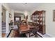 Bright dining room with a large table and a built in hutch at 6023 Twyckenham Dr, Indianapolis, IN 46236