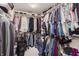 Large walk-in closet with ample hanging and shelving space at 6023 Twyckenham Dr, Indianapolis, IN 46236