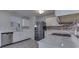 Modern kitchen with white cabinets and stainless steel appliances at 8619 Hopewell Ct, Camby, IN 46113