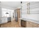 Modern kitchen, stainless steel appliances, marble countertops, and herringbone wood floors at 1003 Alabama St, Indianapolis, IN 46202