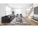 Spacious living room featuring hardwood floors and ample natural light at 1003 Alabama St, Indianapolis, IN 46202