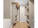 Spacious walk-in closet with ample shelving and hanging rods at 1003 Alabama St, Indianapolis, IN 46202