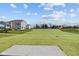 Expansive backyard featuring lush green lawn and providing ample space for outdoor activities at 1069 Ridgevine Rd, Greenwood, IN 46143