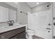 Bathroom featuring vanity sink with dark wood cabinetry, and tub shower at 1069 Ridgevine Rd, Greenwood, IN 46143