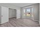 Bedroom featuring a bay window and entry into an adjacent room at 1069 Ridgevine Rd, Greenwood, IN 46143