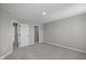 Bedroom with walk-in closet and neutral walls and carpet at 1069 Ridgevine Rd, Greenwood, IN 46143