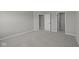 Carpeted bedroom with two closets and neutral paint at 1069 Ridgevine Rd, Greenwood, IN 46143