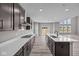 Well-equipped kitchen features a large island, gas cooktop, and plenty of storage at 1069 Ridgevine Rd, Greenwood, IN 46143