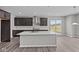 Modern kitchen with stainless steel appliances, quartz countertops and island at 1069 Ridgevine Rd, Greenwood, IN 46143