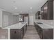 Elegant kitchen with stainless appliances, an island, and plenty of counter space at 1069 Ridgevine Rd, Greenwood, IN 46143