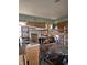 A kitchen undergoing renovation with exposed beams and flooring at 1424 W 8Th St, Anderson, IN 46016