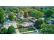 Aerial view of house and neighborhood with lush trees at 1801 Witt Rd, Lebanon, IN 46052
