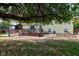 Large backyard with patio, deck, and mature shade tree at 1801 Witt Rd, Lebanon, IN 46052