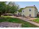 Spacious backyard with deck, patio, and mature tree at 1801 Witt Rd, Lebanon, IN 46052