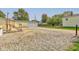 Large backyard with gravel and basketball hoop at 1801 Witt Rd, Lebanon, IN 46052