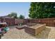Large backyard with raised garden beds and a wooden fence at 1801 Witt Rd, Lebanon, IN 46052