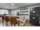 Basement wet bar with seating and shelving at 1801 Witt Rd, Lebanon, IN 46052