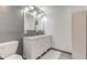 Modern bathroom with double vanity and gray shiplap feature wall at 1801 Witt Rd, Lebanon, IN 46052