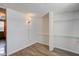 Small bedroom with wood floors and shelving at 1801 Witt Rd, Lebanon, IN 46052