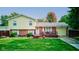 Brick and yellow-sided house with a wooden deck at 1801 Witt Rd, Lebanon, IN 46052