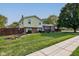 Side view of the house, highlighting the landscaping and curb appeal at 1801 Witt Rd, Lebanon, IN 46052