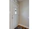White front door with a glass panel and a Halloween doormat at 1801 Witt Rd, Lebanon, IN 46052