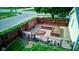 Landscaped garden with raised beds, potting area, and a wooden fence at 1801 Witt Rd, Lebanon, IN 46052